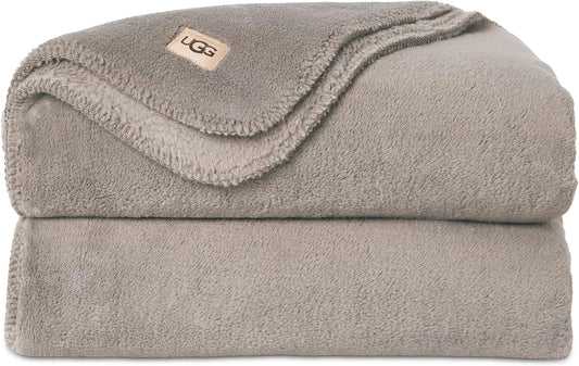 UGG Whitecap Plush Throw Blanket Fleece Lightweight Soft Throw for Couch or Bed Luxury Home Decor for Living Room Washable Hypoallergenic Blankets for Dorm Decor, 50-inch x 70-inch, Light Grey Seal